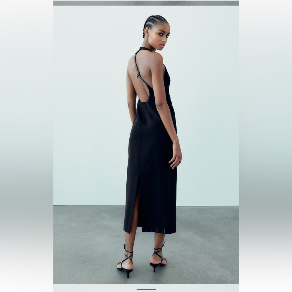 Black high neck Zara dress with asymmetric back detail.